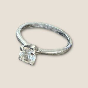 Avon Sterling Silver CZ Solitaire Ring Size 7.5 Elegant Design